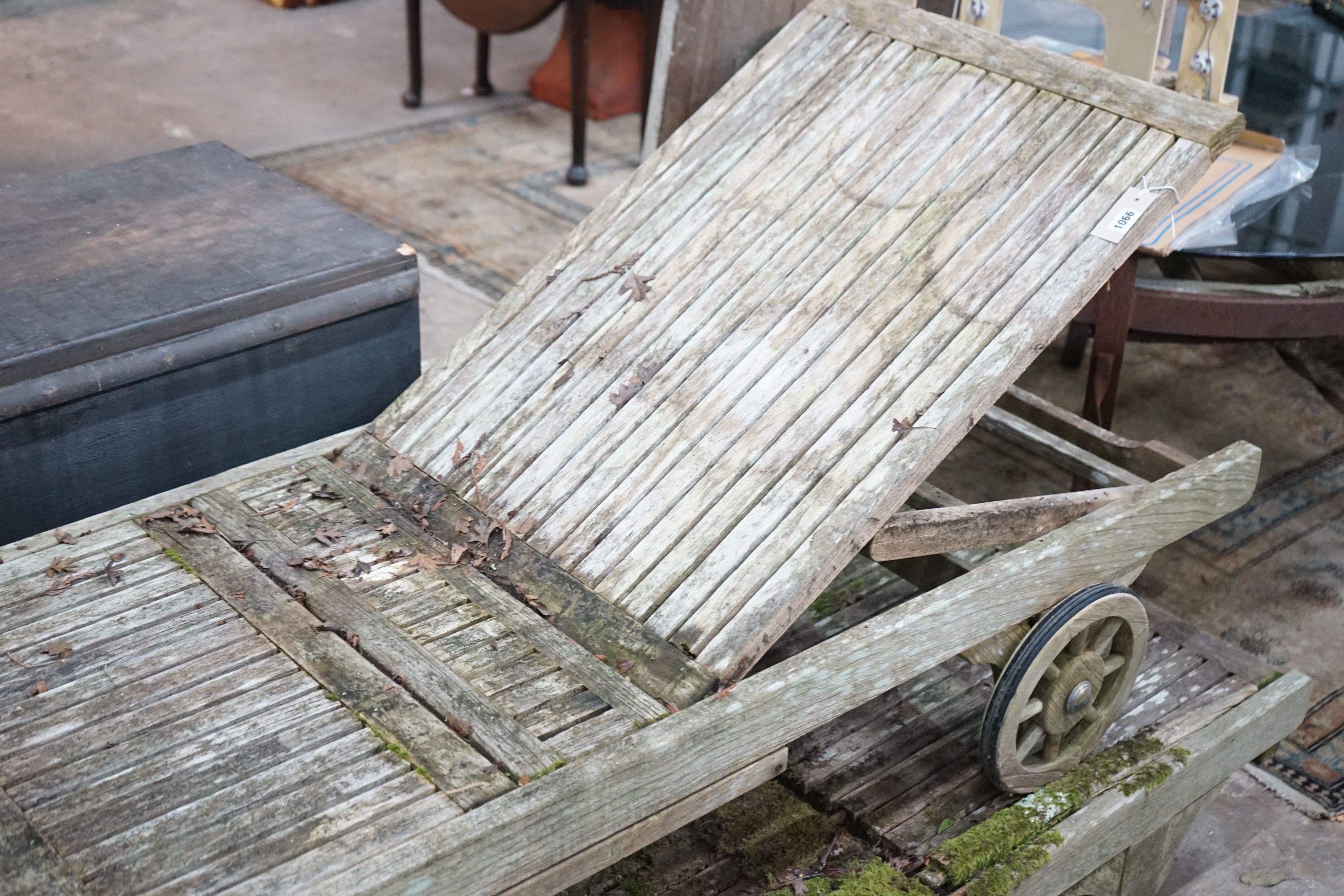 Three teak garden loungers, length 210cm, depth 65cm